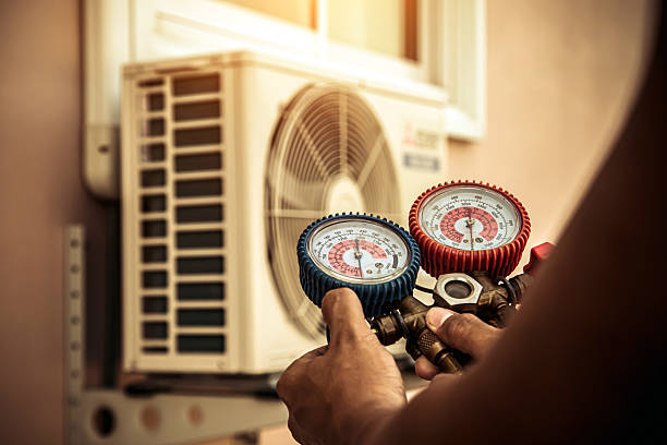 Professional Hvac technician working in Scotts Hill, TN